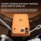 Orange lens protector fitted flush on an iPhone camera bump held in a hand