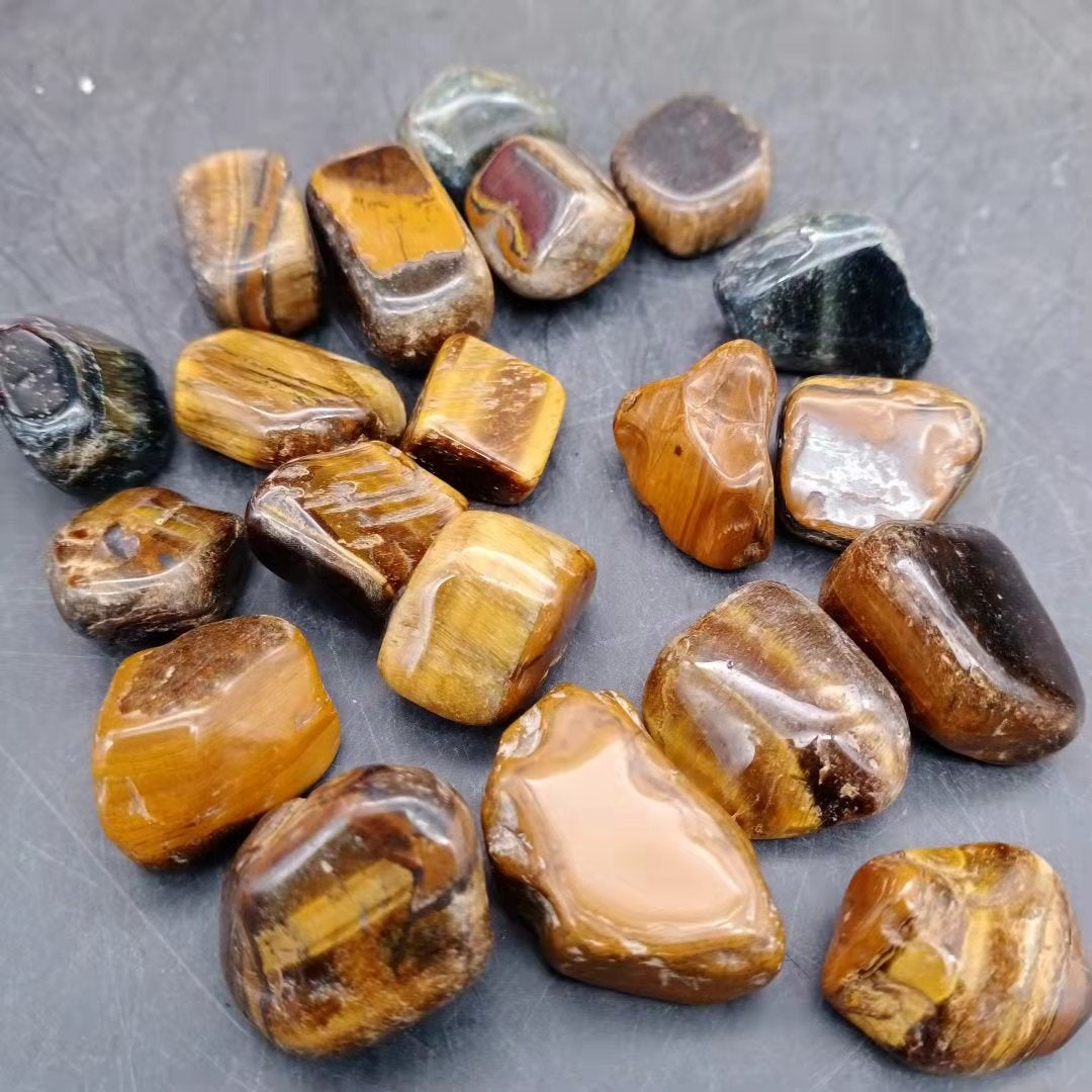 Tiger eye style tumbled stones with banded sheen for tabletop display