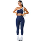 Back view of the one shoulder yoga set showing the high waist leggings and single strap bra