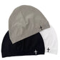 Knitted dome beanie with a small embroidered cross on the folded front cuff, no brim