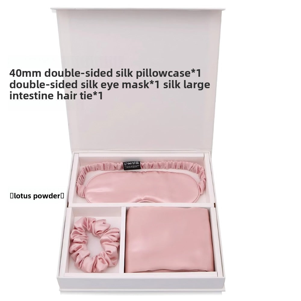 Mulberry silk pillowcase, mask and scrunchie styled in a relaxed bedroom scene
