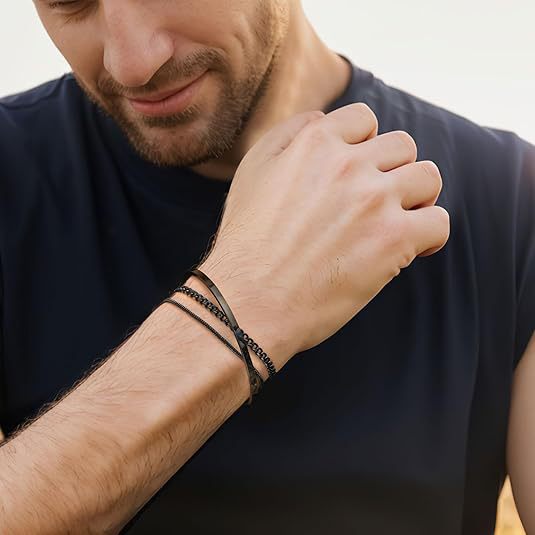 Three piece steel bracelet set with a snake chain, curb chain and flat bar bangle