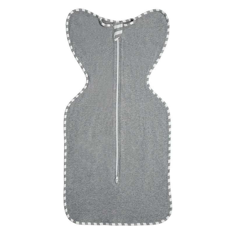 Baby swaddle sleeping bag styled in a calm nursery, soft cotton sleep sack