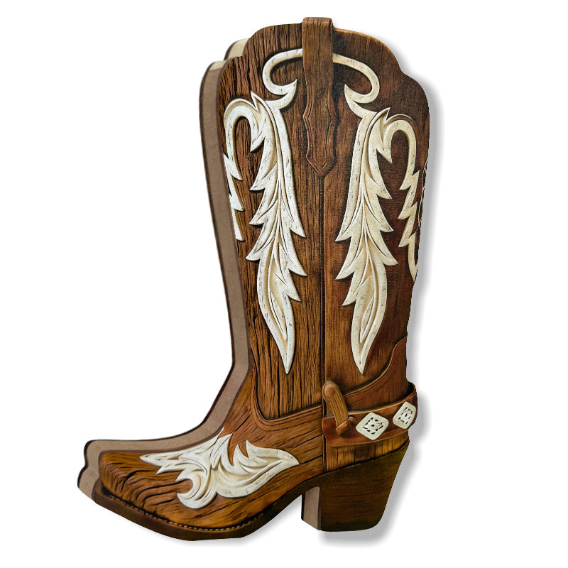 Brown poplar cowboy boot wall decor with raised cream feather scrollwork, on white