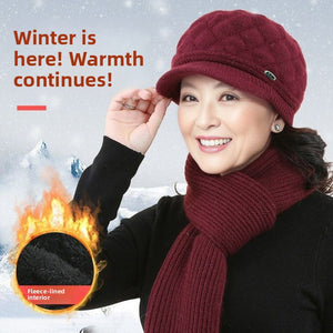 Woman in a burgundy quilted knit hat and ribbed scarf with a view of the fleece lining inside a circle