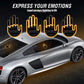 Four lit amber hand-shaped LED lights above a silver car with hand lights visible on its windows