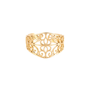 Gold tone openwork ring on white, petal rosette at the centre and an open back