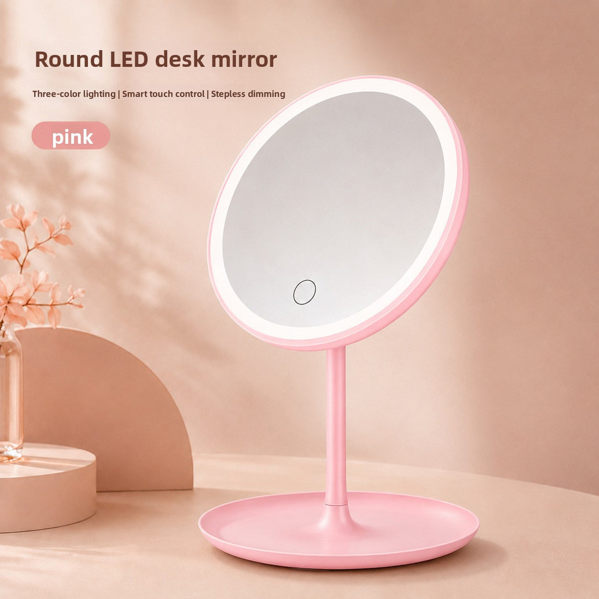 Round peach pink LED desk mirror on a pink round tray base with blossom branches, peach pink option