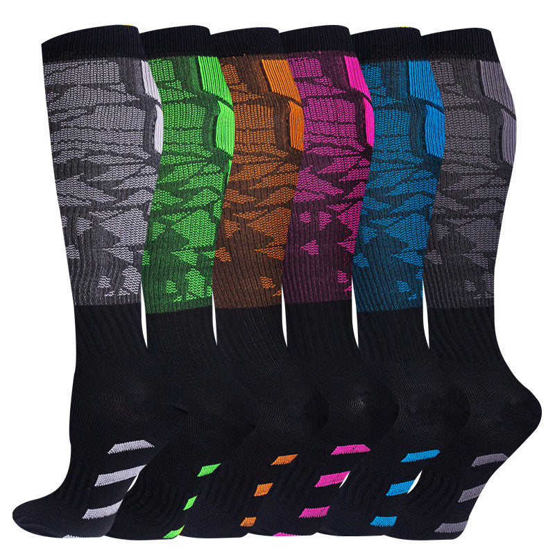Knee-high compression socks modeled during a run to show the snug leg fit