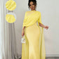 Bright yellow chiffon cape sleeve long gown with cinched waist and floor length skirt, on model