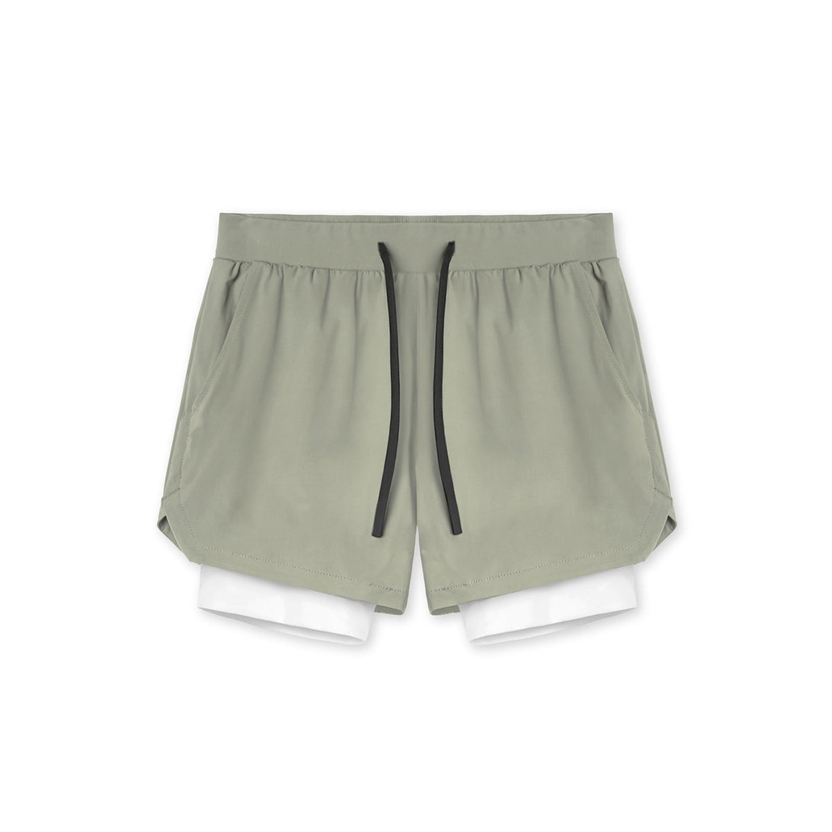 Two in one training shorts in sage green shown flat with the inner liner, back view