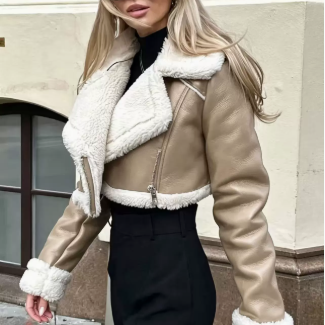 Cropped vegan leather sherpa aviator jacket shown on the body, short hem at the natural waist