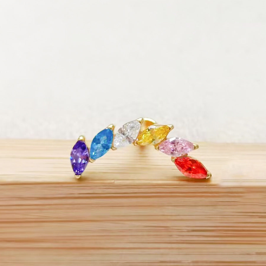G23 titanium piercing stud with a curved row of marquise cubic zirconia stones