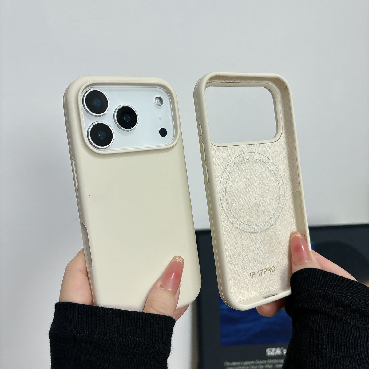 Magnetic silicone phone case with full back and side coverage and raised protective edges on white