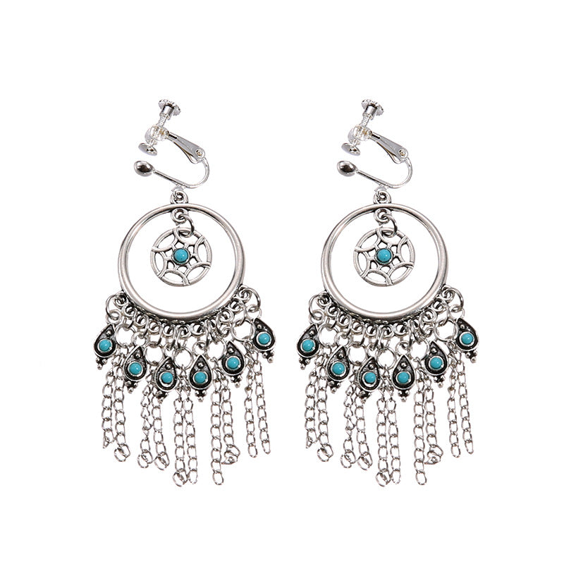 Boho vintage clip-on drop earrings with fringe and bead accents, zinc alloy build, studio image on white background