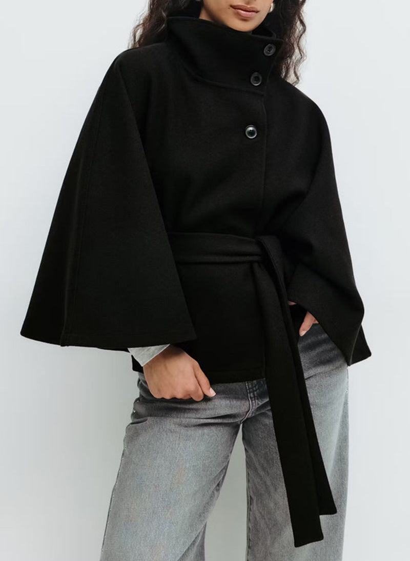 Brown belted cape jacket knotted at the waist with a buttoned stand collar and cape sleeves