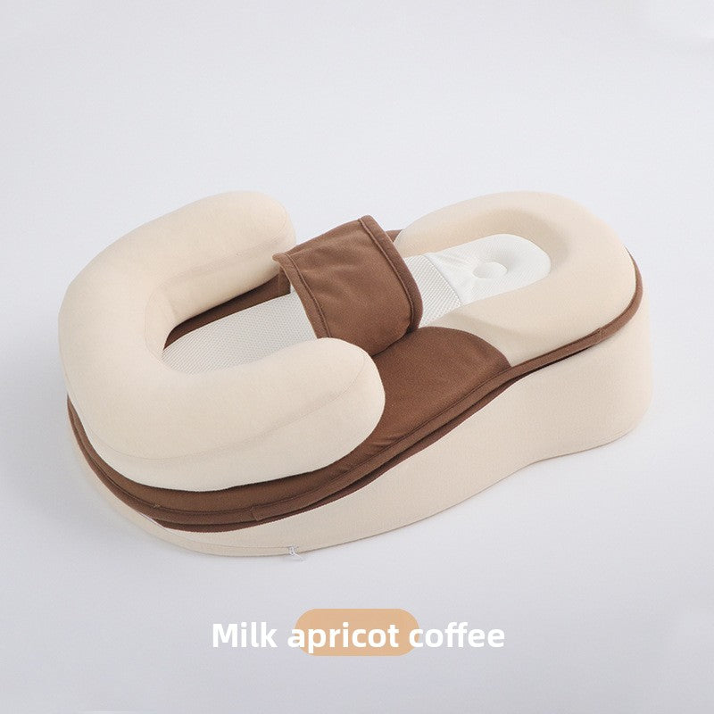Cream and coffee brown baby positioning lounger with U-shaped bolsters, mesh panel and body strap