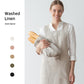 Front view of natural linen apron with two patch pockets at the waist