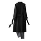 Black double faced wool coat detail of the cuff strap and sleeve