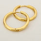 Both earrings worn together with hair pulled back behind the ears
