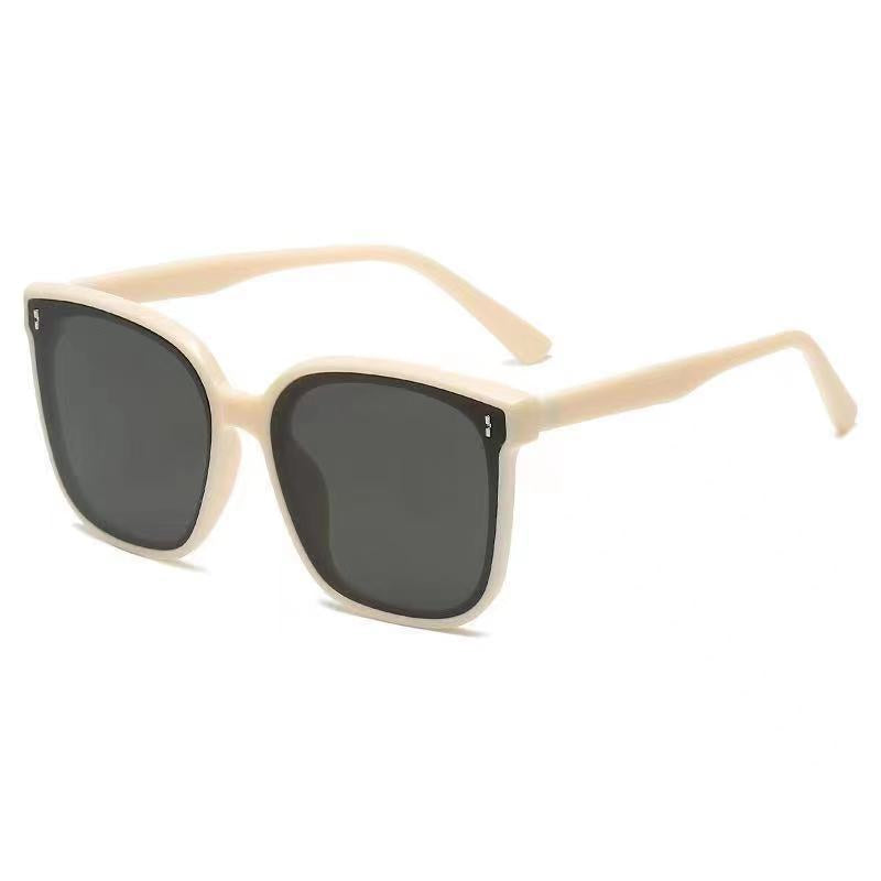 Three colorways of square frame sunglasses in black, beige, and smoke grey