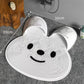 White bristle bath mat with a cute animal face design measuring 45 by 45 cm