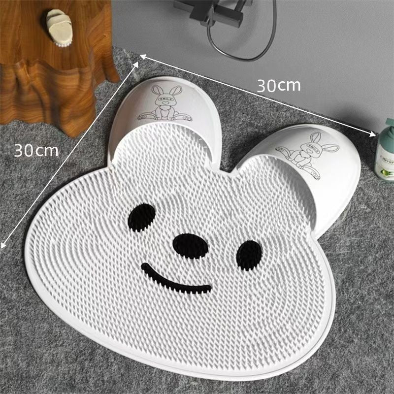White bristle bath mat with a cute animal face design measuring 45 by 45 cm
