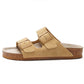 white two strap slide sandal showing the natural cork midsole
