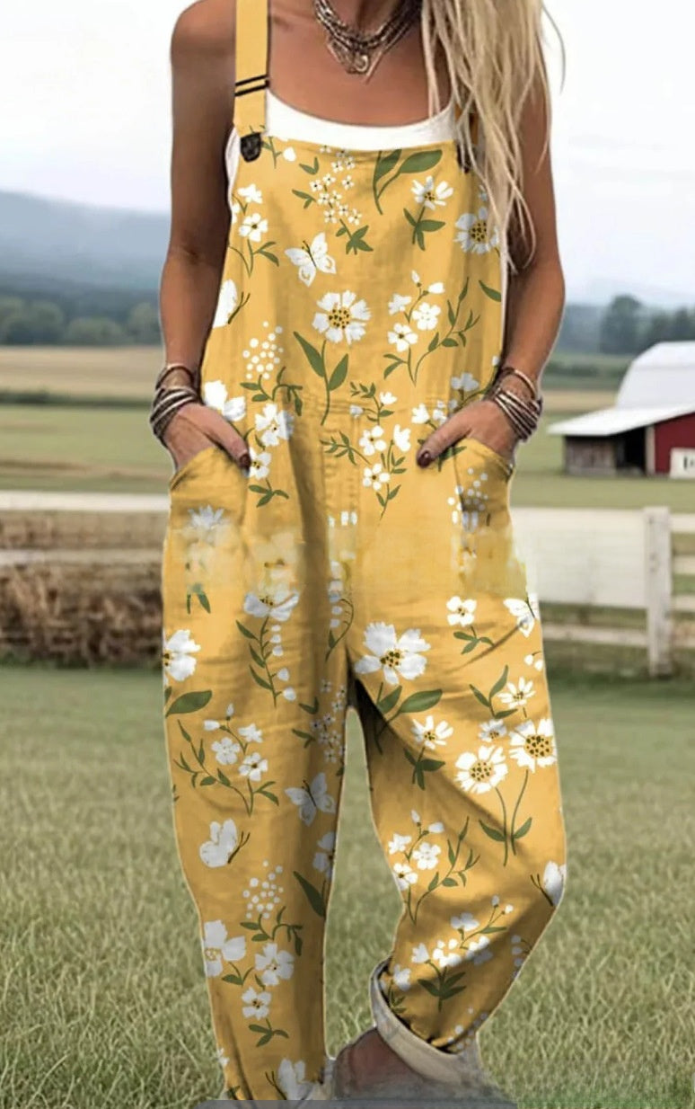 Sleeveless dungaree jumpsuit in a digital print with two deep front pockets
