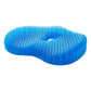 Blue honeycomb gel seat cushion resting on an office chair