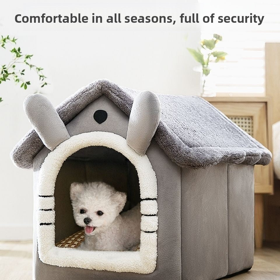 Gray wool blend pet house with a small dog curled inside