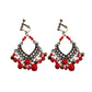 Boho vintage clip-on drop earrings with fringe and bead accents, zinc alloy build, studio image on white background