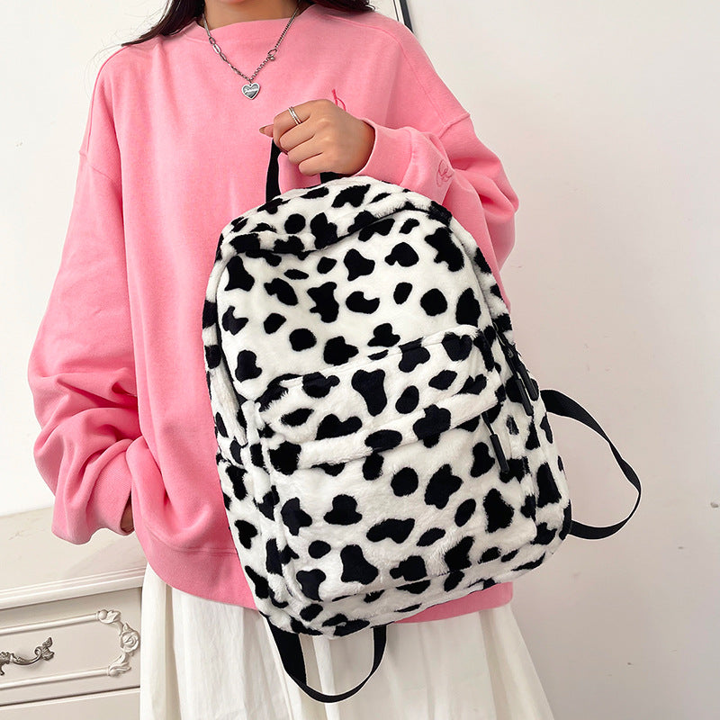 Plush Leopard Print Backpack | side profile detail close up
