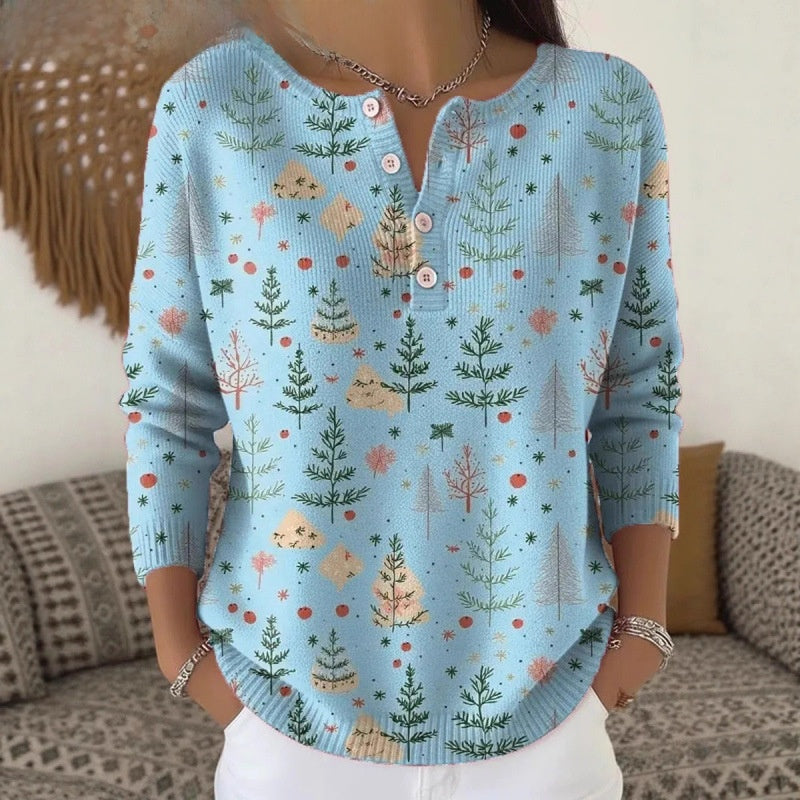 Blue Christmas tree print Henley knit top worn with notch button placket