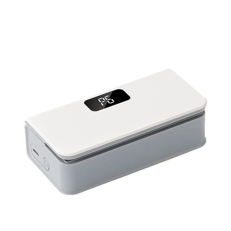 White Gen1 6 step portable food sealing machine with a digital display, angled front view