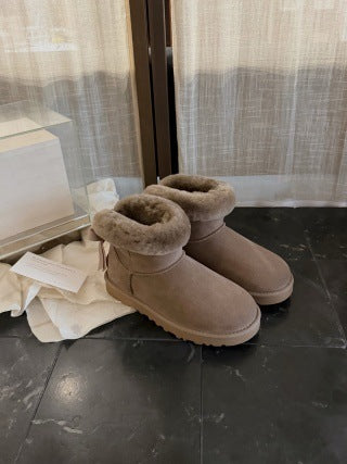 Taupe ankle boots with folded shearling cuffs on a dark floor, Taupe Double Layer Ribbon option, size 36