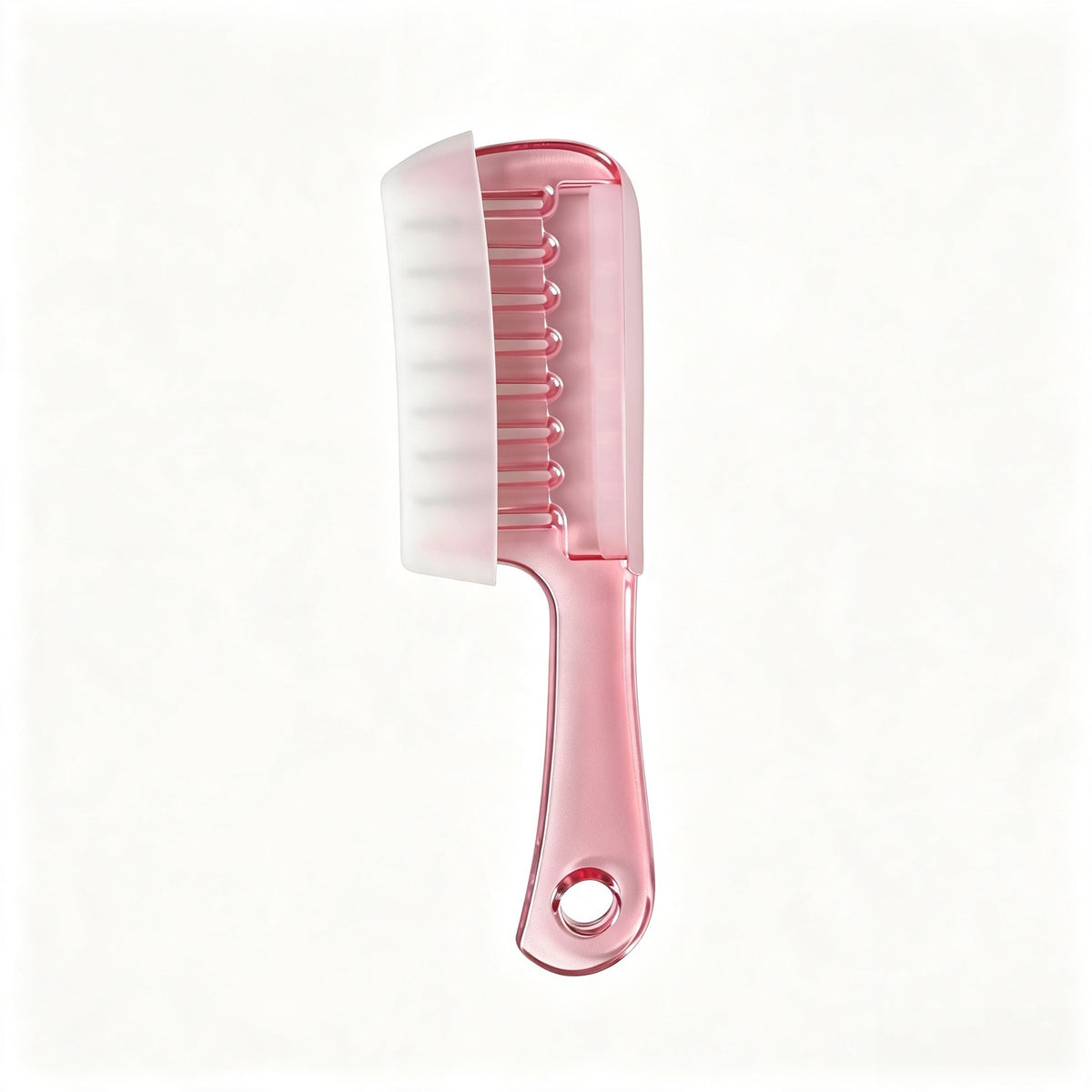 Clear crystal massage comb with wide teeth and metal tipped pins for scalp serum application