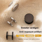 Steel and black stainless steel disc barbell studs resting on a cream knit