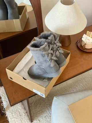 Gray mid-height boots with stacked bows and shearling cuffs in a box, Gray Double Ribbon Thin Sole option, size 40