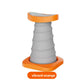 Vibrant orange push-up support stand with a ribbed gray elastic column, orange top pad and orange base plate, orange label