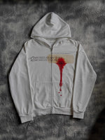 White Y2K zip-up hoodie with printed bandage and red drip graphic across the chest