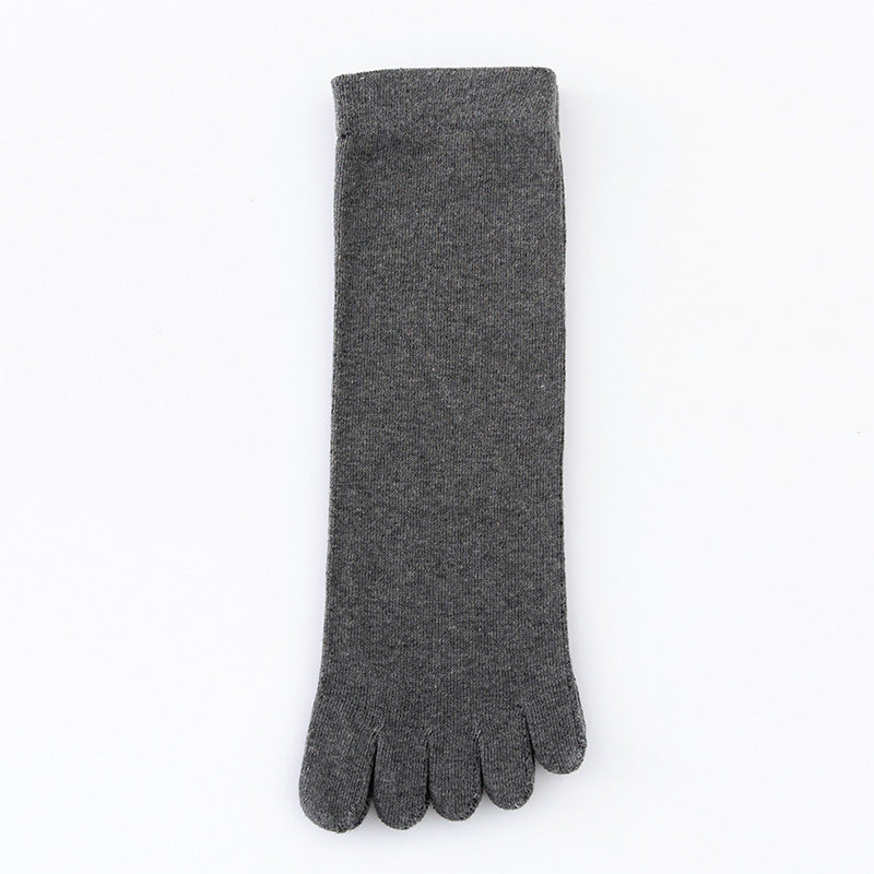 Dark gray five-toe cotton sock laid flat showing its mid-calf length
