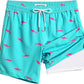 Dark tropical leaf print swim trunks with pink drawstring and liner