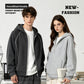 Man in a dark grey zip hoodie and woman in a heather grey zip hoodie, worn with white tees in a studio