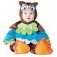 Baby in a brown owl costume with a green and blue feathered chest and orange foot pads, Owl option, 90cm size