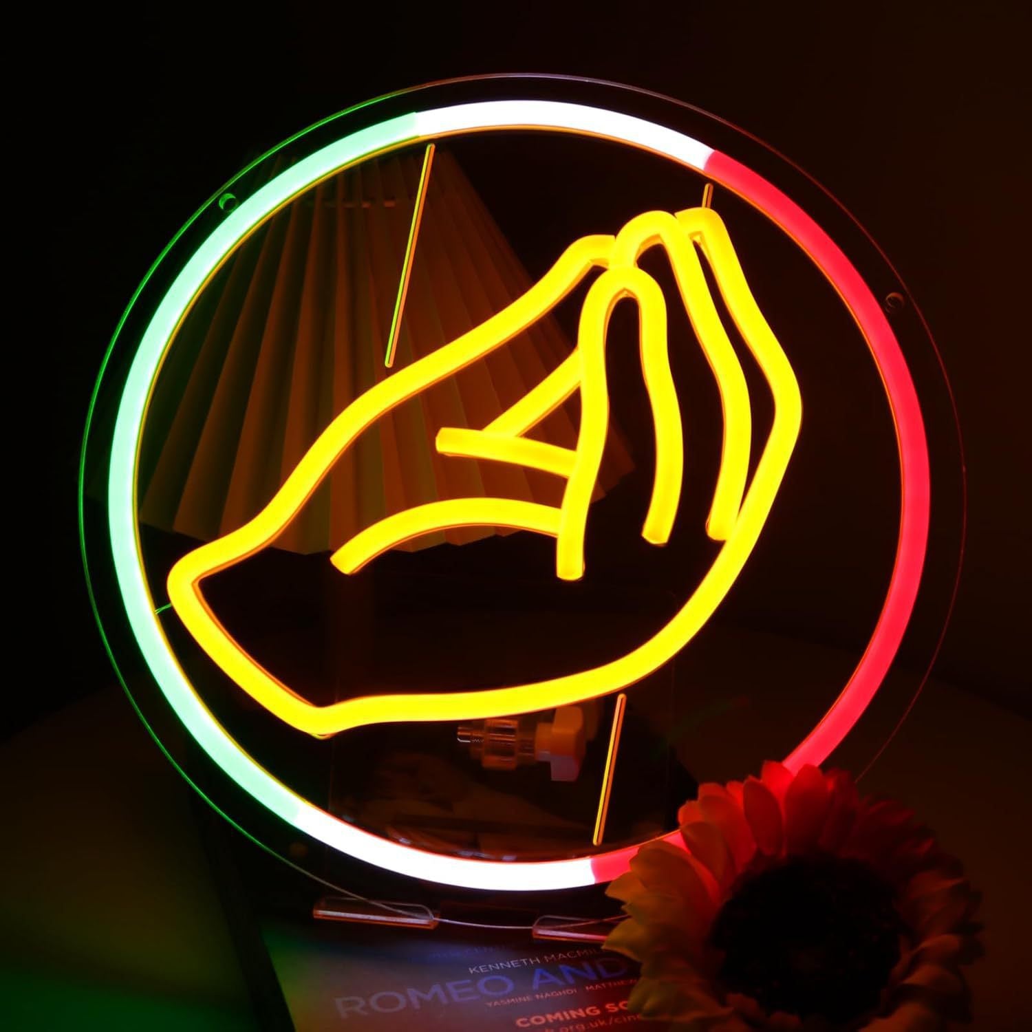 LED neon wall light sign, glowing against a dark wall