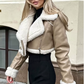 Detail of the sherpa fleece collar and lapel on the cropped vegan leather jacket