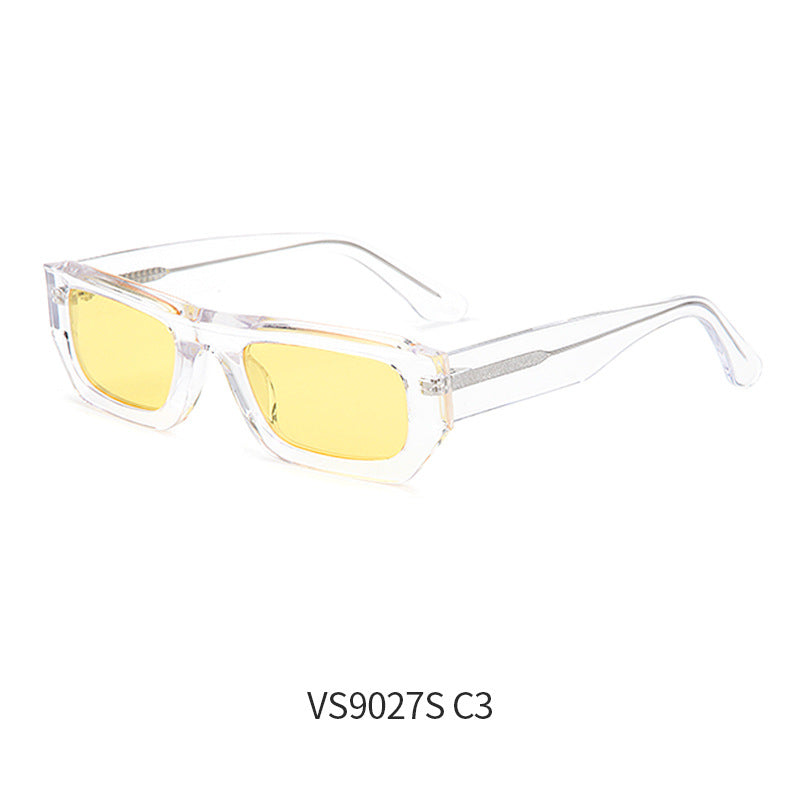 Rectangular sunglasses with a translucent yellow frame and tinted lenses