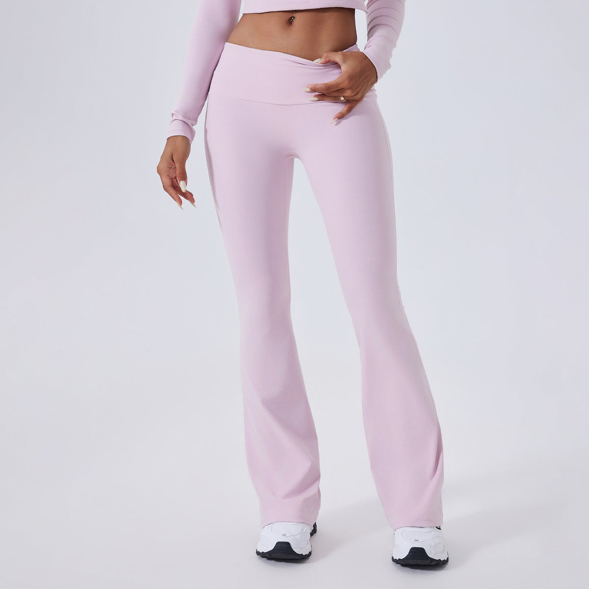 Detail of the inner thigh seam and side pocket on the yoga pants