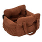 Padded car seat pet bed with raised bolster walls, carry handles and an inner clip showing the inner clip on its strap